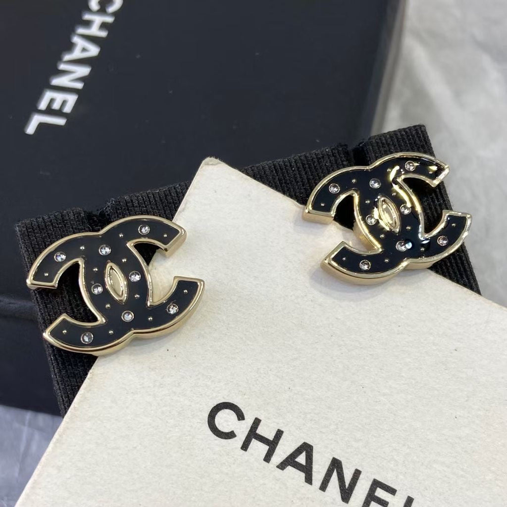 Chanel Black Star Earrings